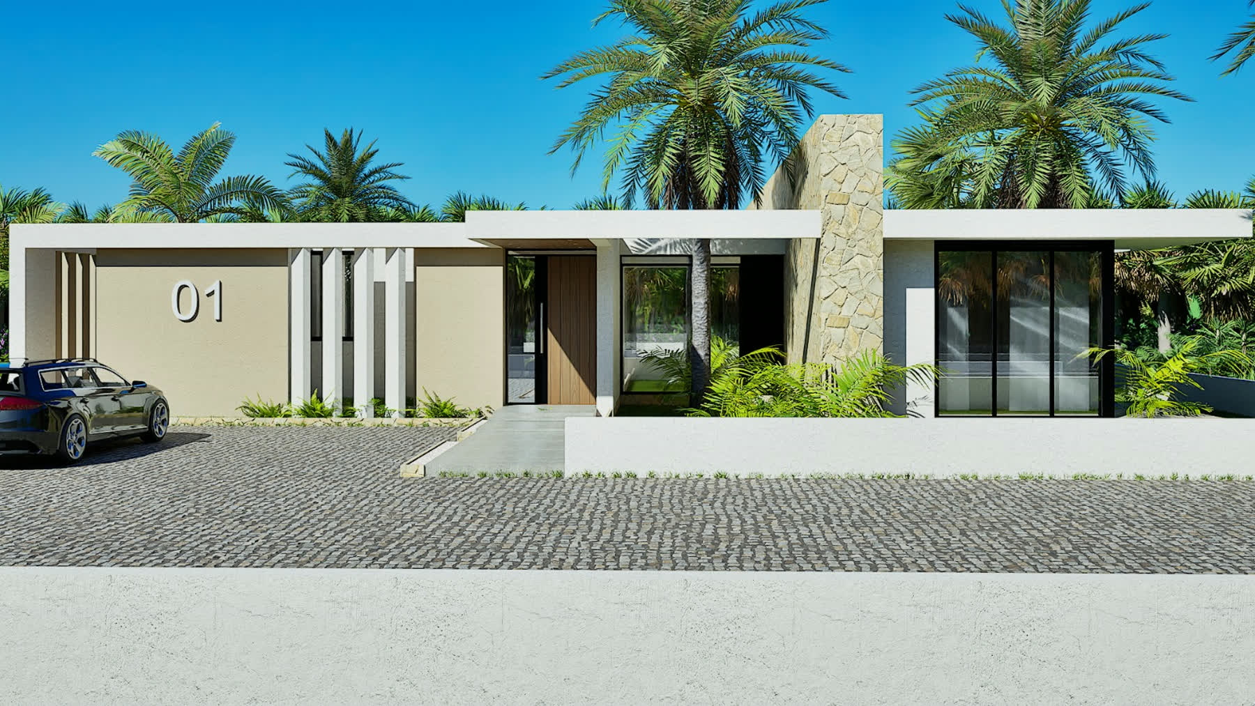 The arrival court — sculptural facade and cobblestone driveway